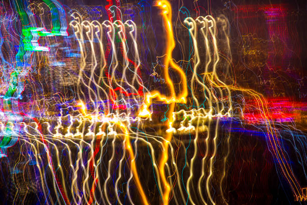 istock Abstract experimental surreal photo , long exposure, city and vehicle lights.Quantum physics and lines of light particles photons 959347530