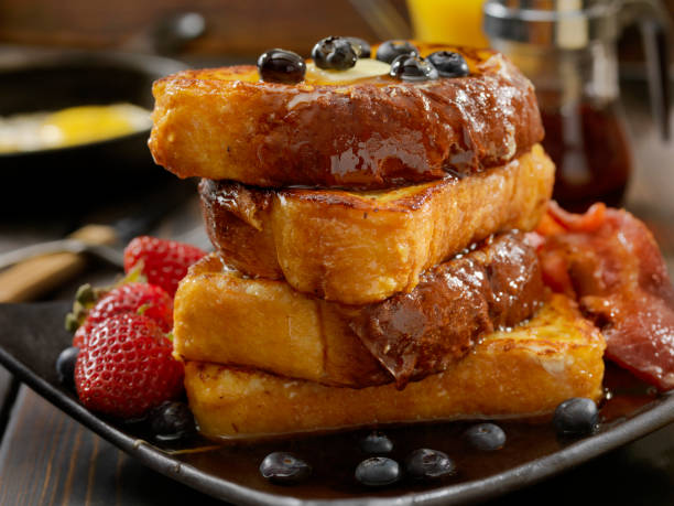 Brioche French Toast with Bacon, Eggs and Fresh Fruit