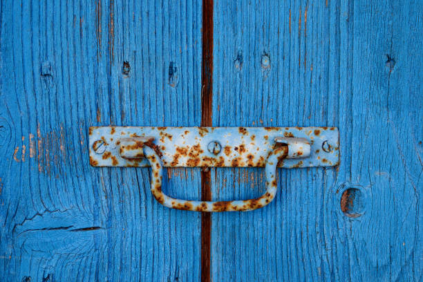 istock Old rustic wooden door with knob 959351534