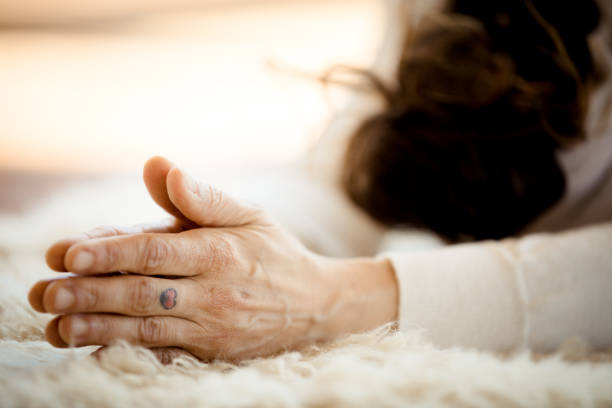 istock Kundalini. Woman practicing yoga. Sun salutation 959352590