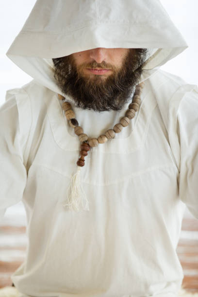 istock Kundalini. Man practicing yoga. Meditating in lotus pose 959352754