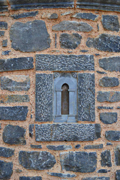 istock Old church wall with window on Greece 959352942