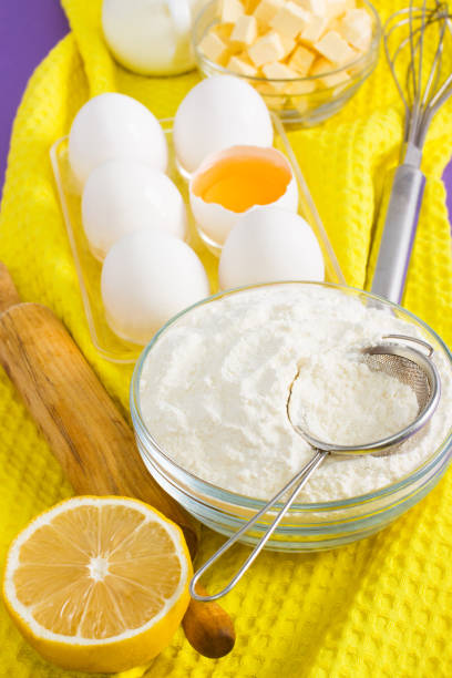 istock Ingredients for baking lemon a cup of floor rolling pin 959353062
