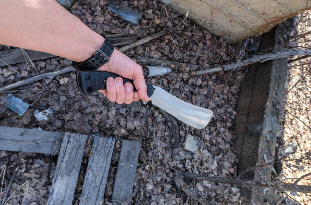 istock A big knife in his hand. A machete in his hand. 959353066
