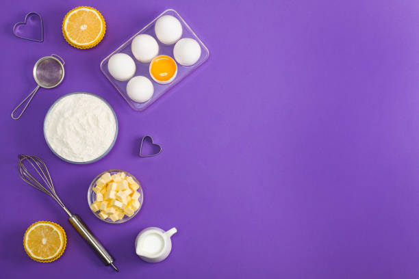 istock Baking flat lay background with eggs floor butter lemon muffins 959353072