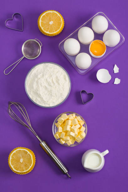 istock Baking flat lay background with eggs floor butter lemon muffins 959353074