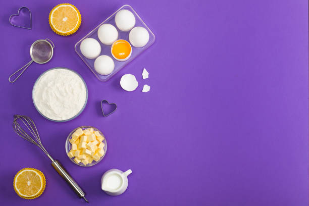 istock Baking flat lay background with eggs floor butter lemon muffins 959353126