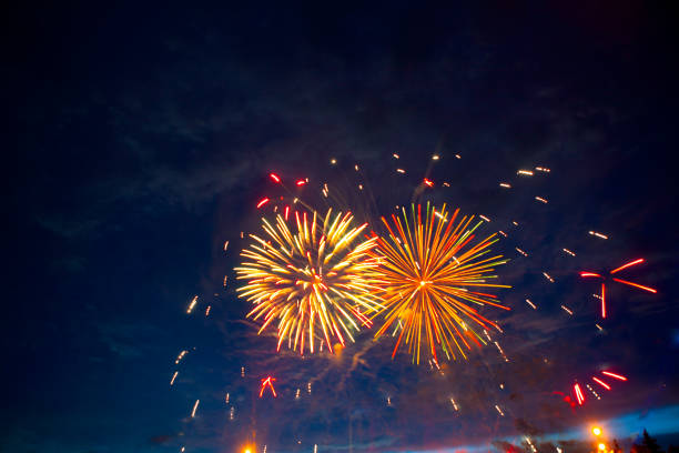 istock Beautiful colorful fireworks on sky. International Fireworks. Fireworks display on dark sky background. Independence Day, 4th of July, Fourth of July or New Year 959355690