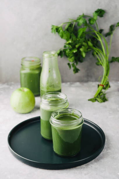 istock Healthy green detox  smoothie drink ingredients 959356516