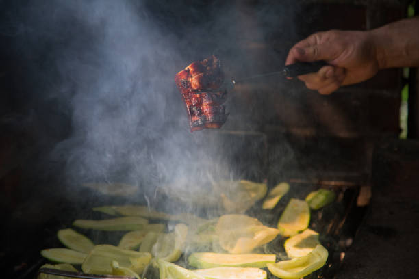 istock Close-up of bacon on the grill 959364410