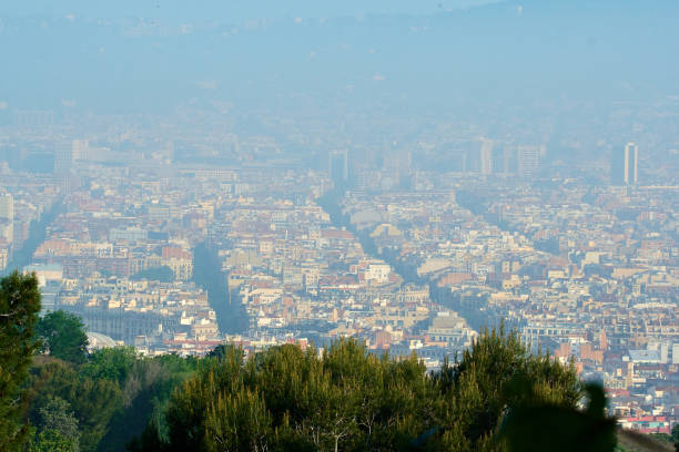 Barcelona's sunrise, foggy day in springtime.
