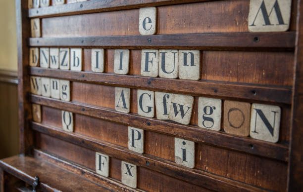 istock Old school wooden board with letters for spelling 959367292