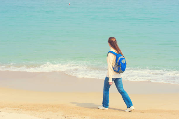 istock girl on the beach 959372110