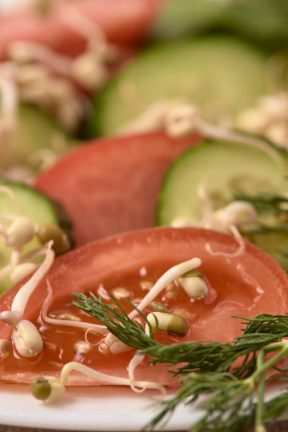 istock Tomatoes and cucumbers. Fresh salad. Healthy food 959386866