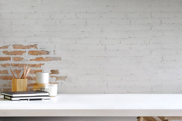 istock Workspace desk mockup black blank poster and artist accessory with copy space. 959394406
