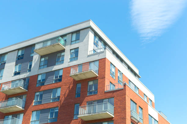 istock Modern condo buildings with huge windows 959399174