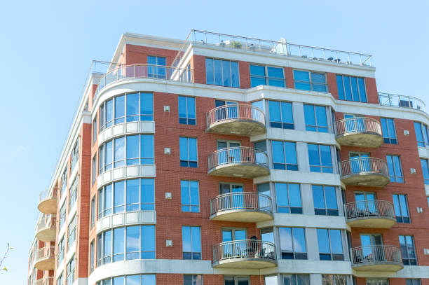 istock Modern condo buildings with huge windows 959399198