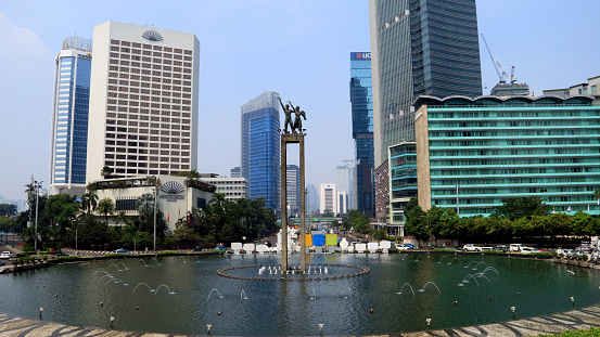 Jakarta, Indonesia - May 15, 2018: View of Hotel Indonesia Roundabout (Bundaran HI) in the afternoon.