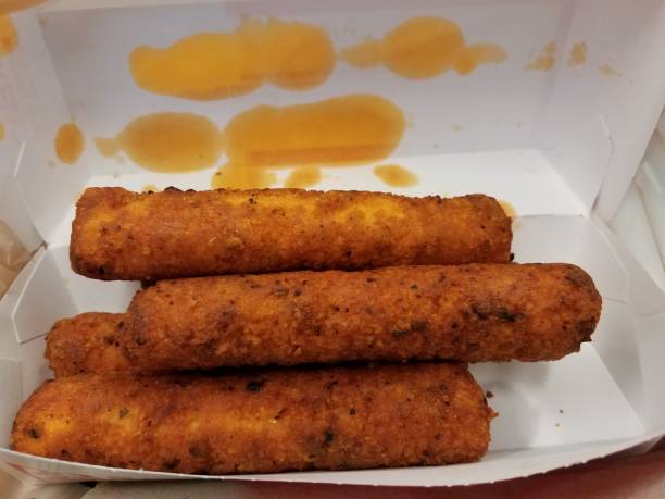 istock spicy chicken rolls with grease in a box 959403438