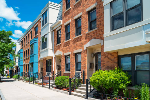 New townhomes in East Boston Massachusetts USA Stock photograph of new townhouses in East Boston, Massachusetts, USA on a sunny day. east boston stock pictures, royalty-free photos & images