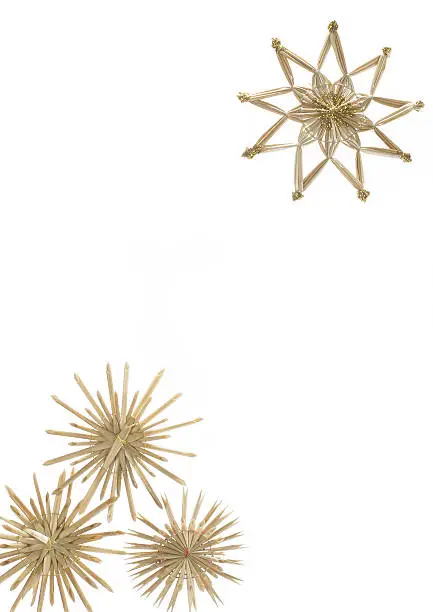 Studio photography of some straw stars isolated on white
