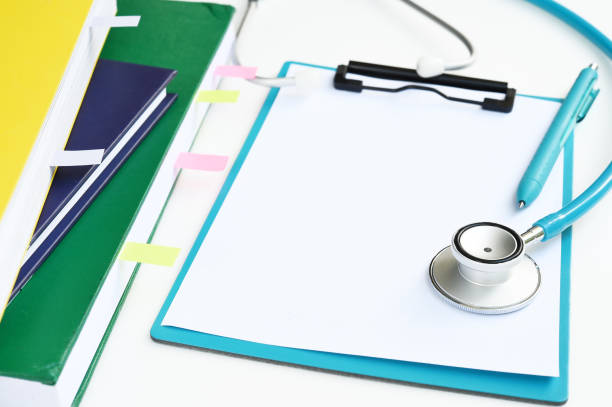 istock close up of stethoscope with notebook 959411798