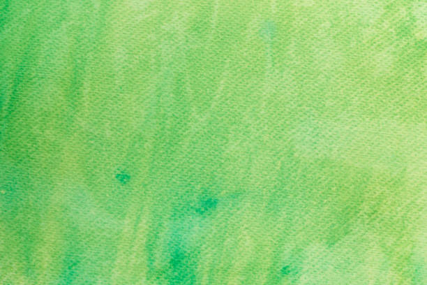 istock green watercolor painted on paper background texture 959412010