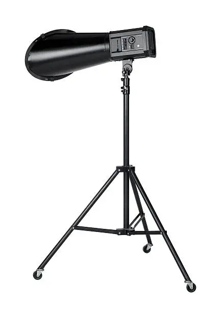 studio-flashlight on tripod isolated on white with clipping path