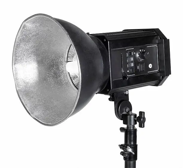 detail of a studio flashlight isolated on white with clipping path