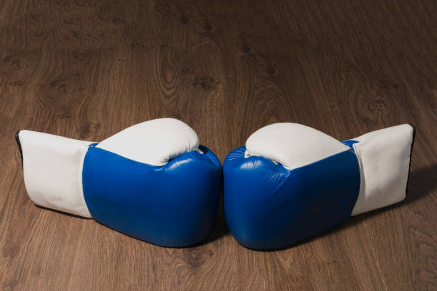 istock Boxer's professional outfit on a wooden background 959423470
