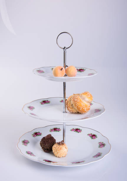 istock tray or three tier serving tray with dessert on background 959429868