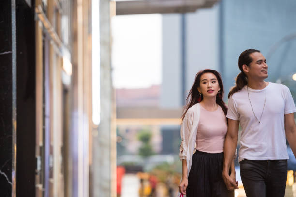istock Couple enjoying an evening out shopping 959433664