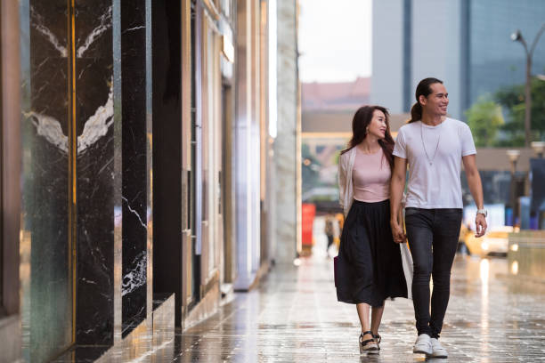 istock Couple enjoying an evening out shopping 959433666