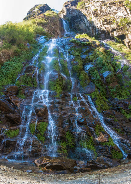 istock A beautiful little waterfall in the Himalayas. 959437832