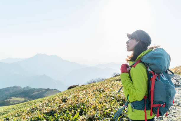istock Woman is enjoying hiking in nature 959438408