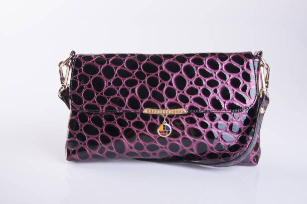 istock leather woman handbag on background 959438734