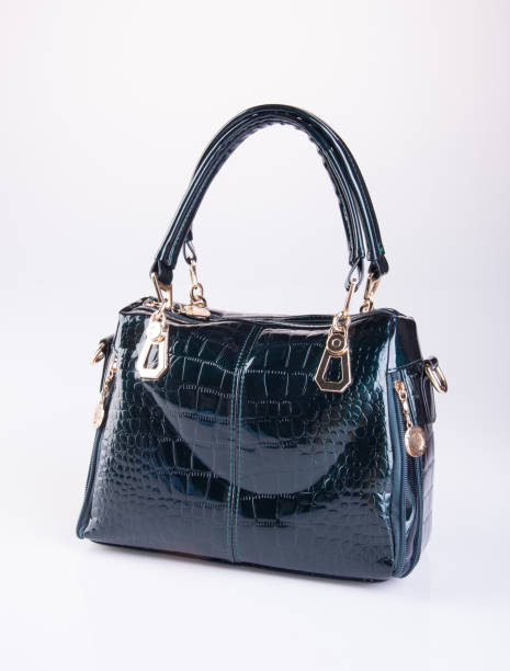 istock leather woman handbag on background 959442580