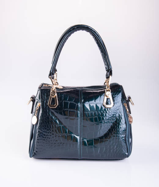 istock leather woman handbag on background 959442584