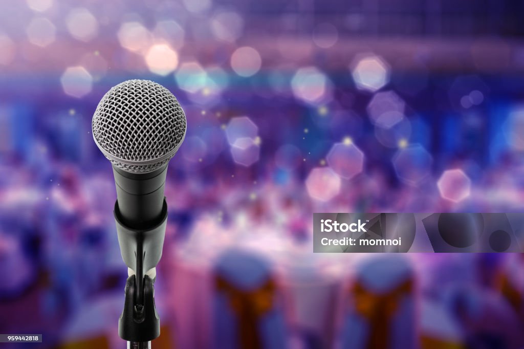 Close up microphone on stage in Ball room Close up microphone  on stage in Bdynamicall room. Microphone Stock Photo