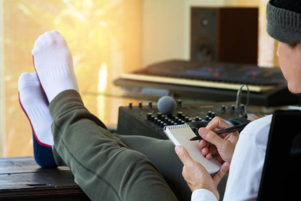 music producer working in home recording studio. - human finger sound mixer music producer imagens e fotografias de stock