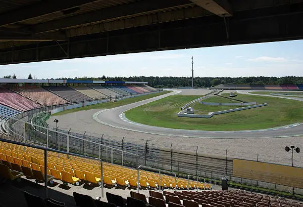racetrack named "Hockenheimring" in Southern Germany, seen from a roofed tribune