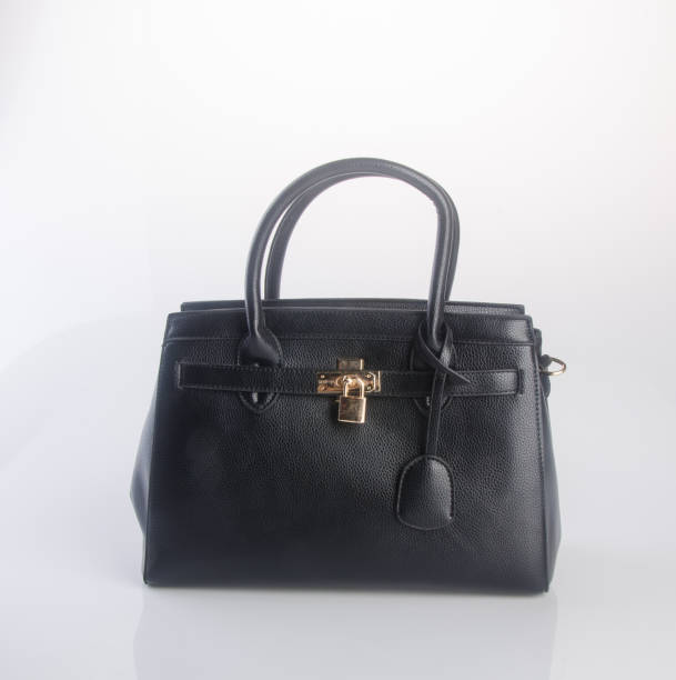 istock woman bag on a background 959448620
