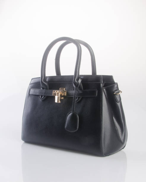 istock woman bag on a background 959452538