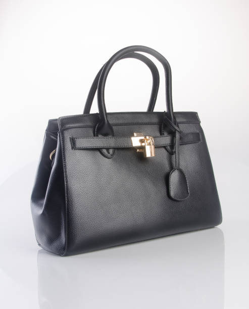 istock woman bag on a background 959453328