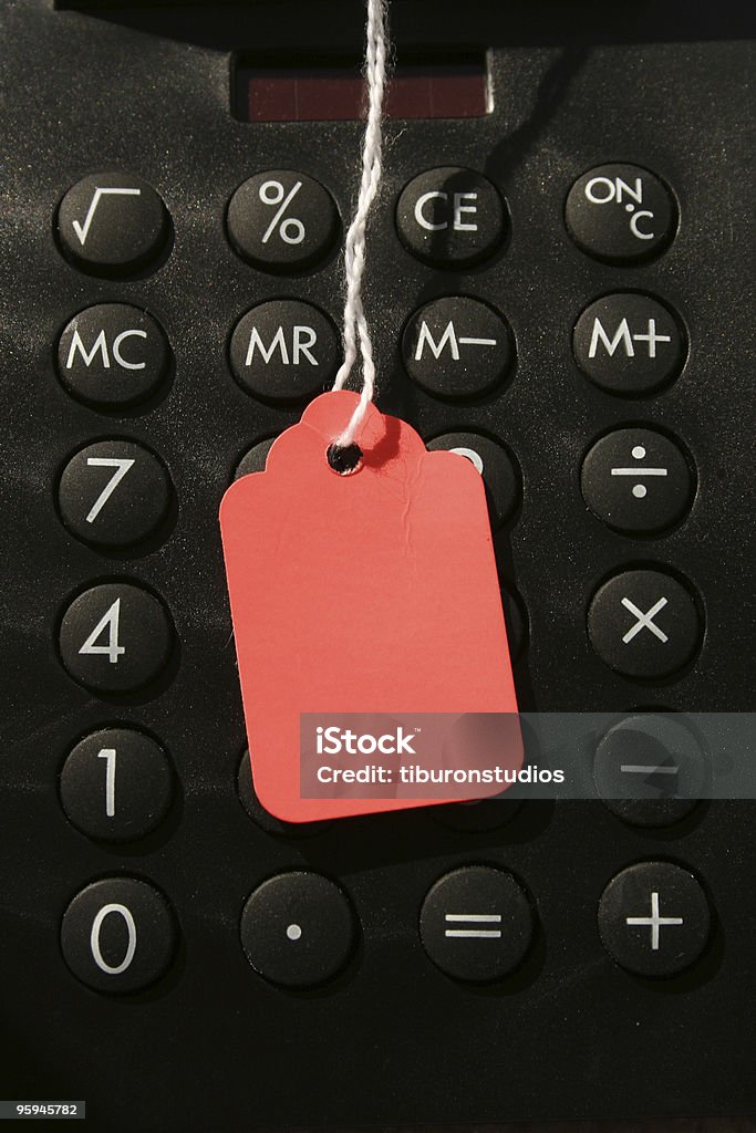 Calculatrice et rouge étiquette de vente: De combien&nbsp;? - Photo de Chiffre 0 libre de droits