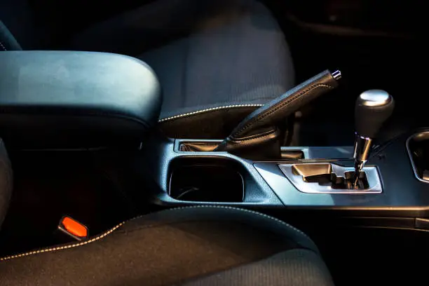 Handbrake and gear shift in modern car interior