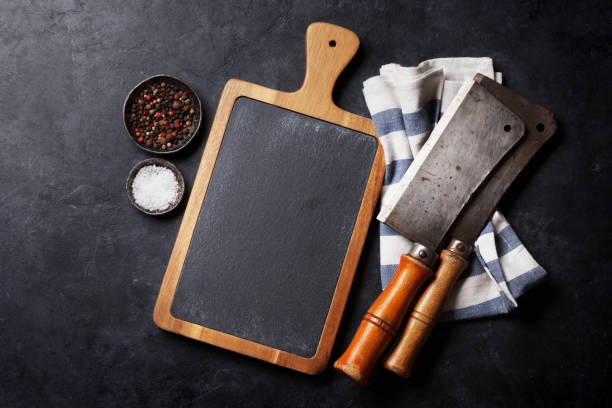 istock Butcher. Vintage meat knives, spices and board 959462414