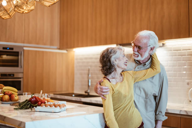 istock senior couple portrait in the kitchen 959462956