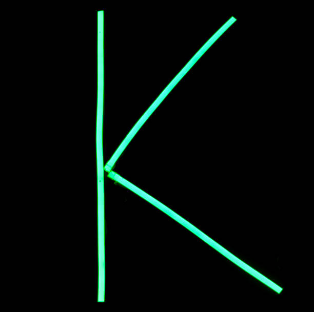 istock Green neon lights alphabet letters 959463068