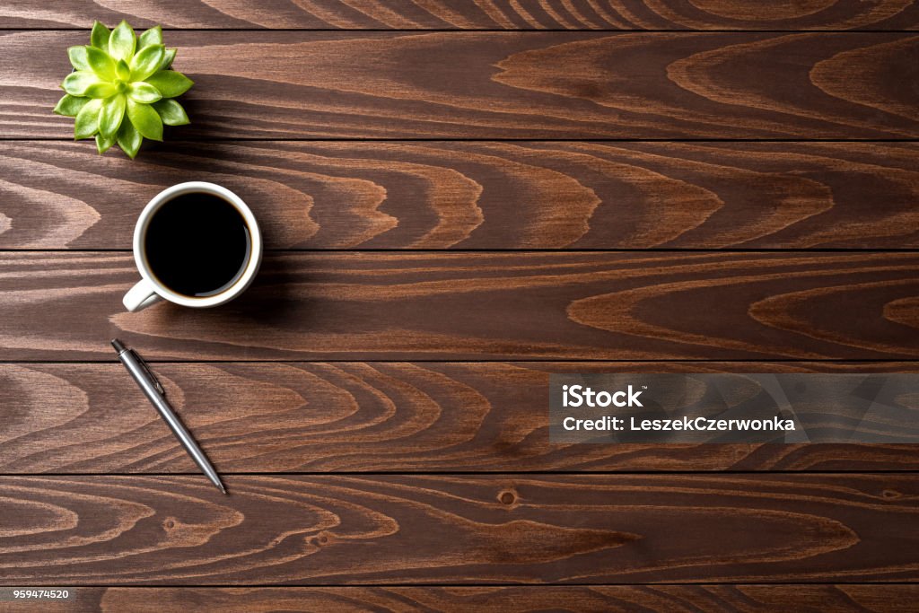 Office desktop with cup of coffee. Top view Desk Stock Photo